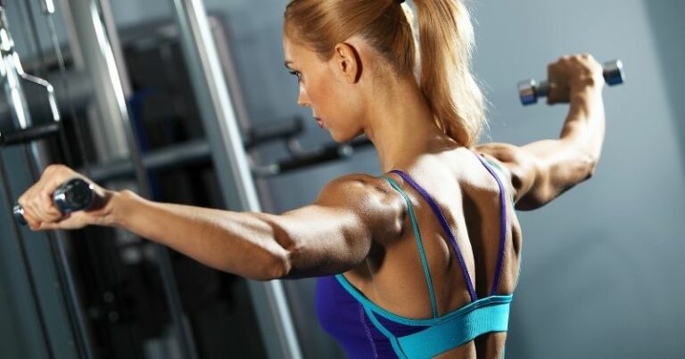 Shoulder Workout for Beginners - a woman performing dumbbell flys