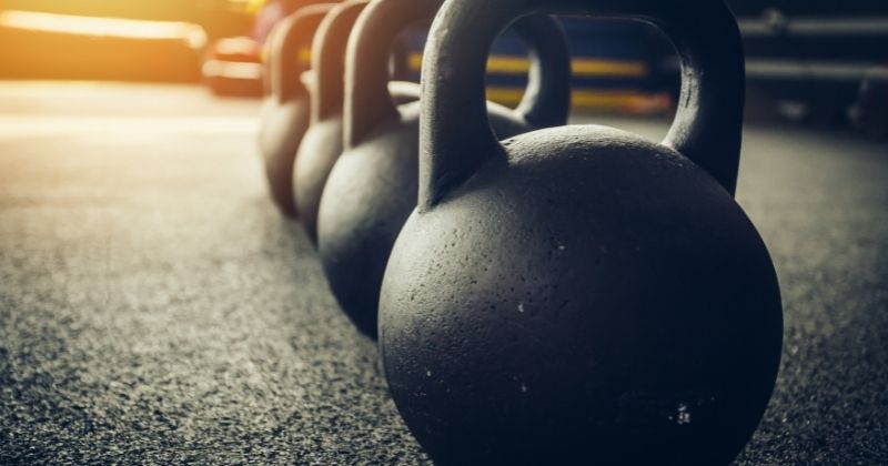 Home Gym Equipment - rows of kettlebells