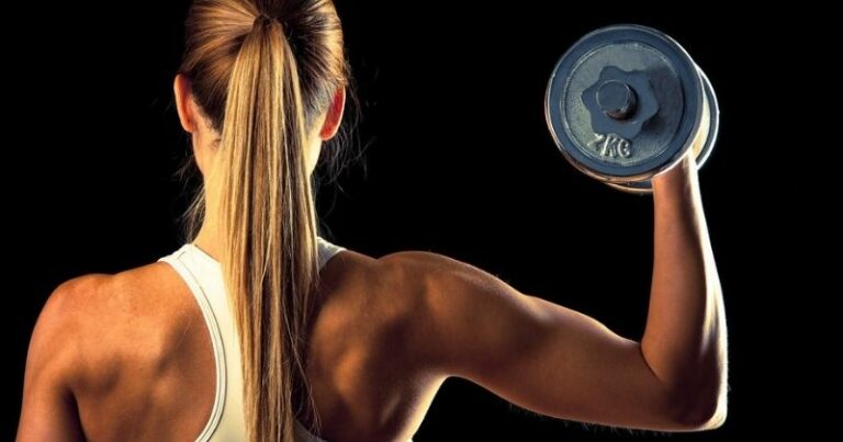 back workouts for women – attractive young woman working out with dumbbells