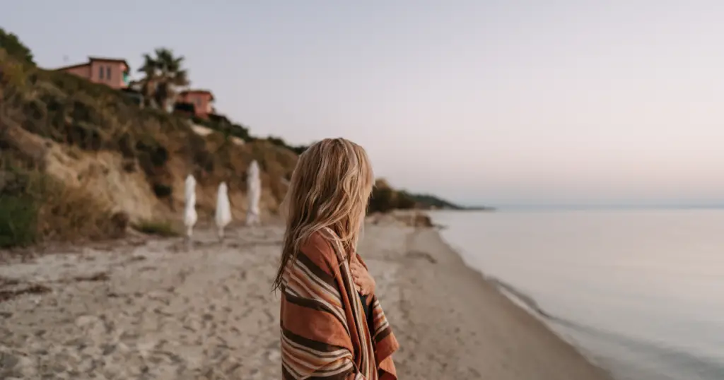 Trauma-related dissociation - Woman alone on a beach