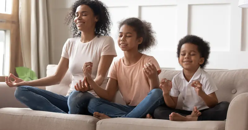 Trauma-related dissociation - Woman and her children meditating