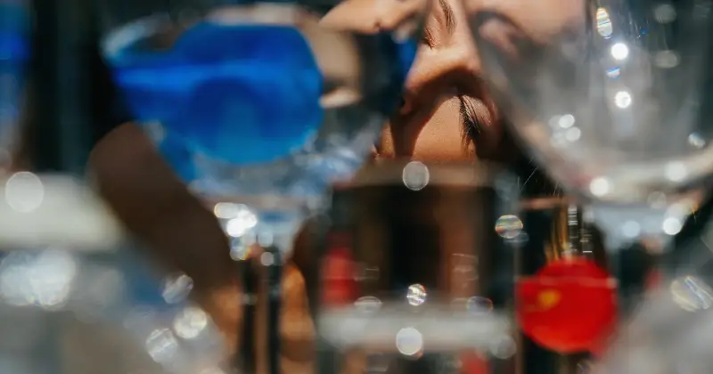 Trauma-related dissociation - Woman passed out laying her head on a table full of wine glasses